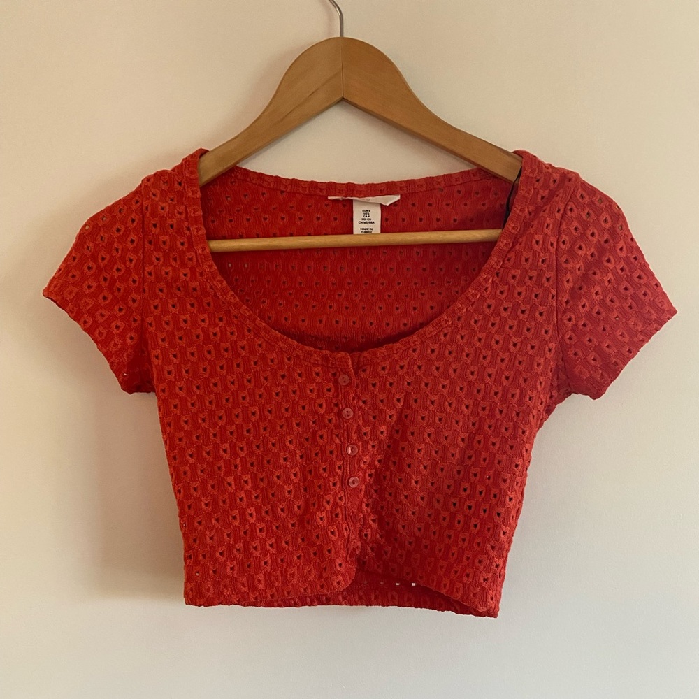 H&M orange crop top size S with button placket.
